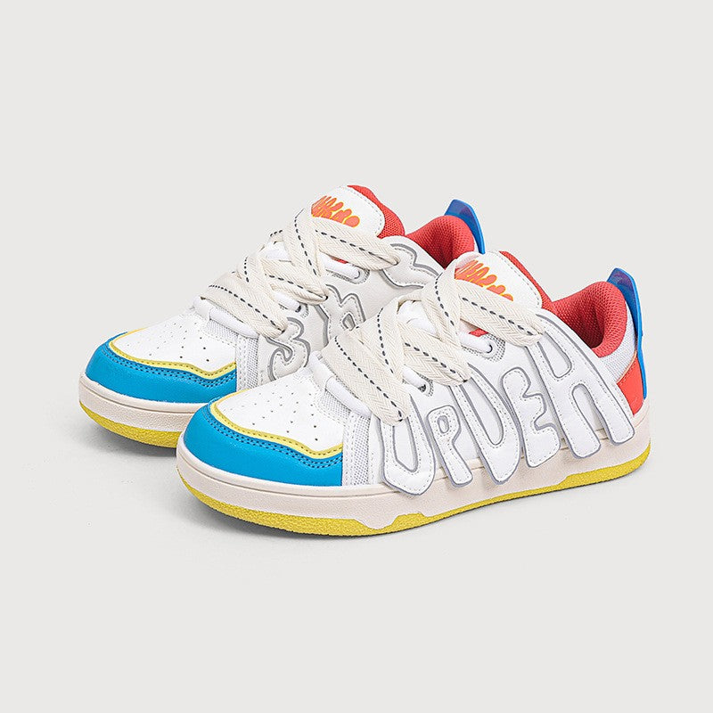Colorful children's sneakers with visible branding on a light gray background