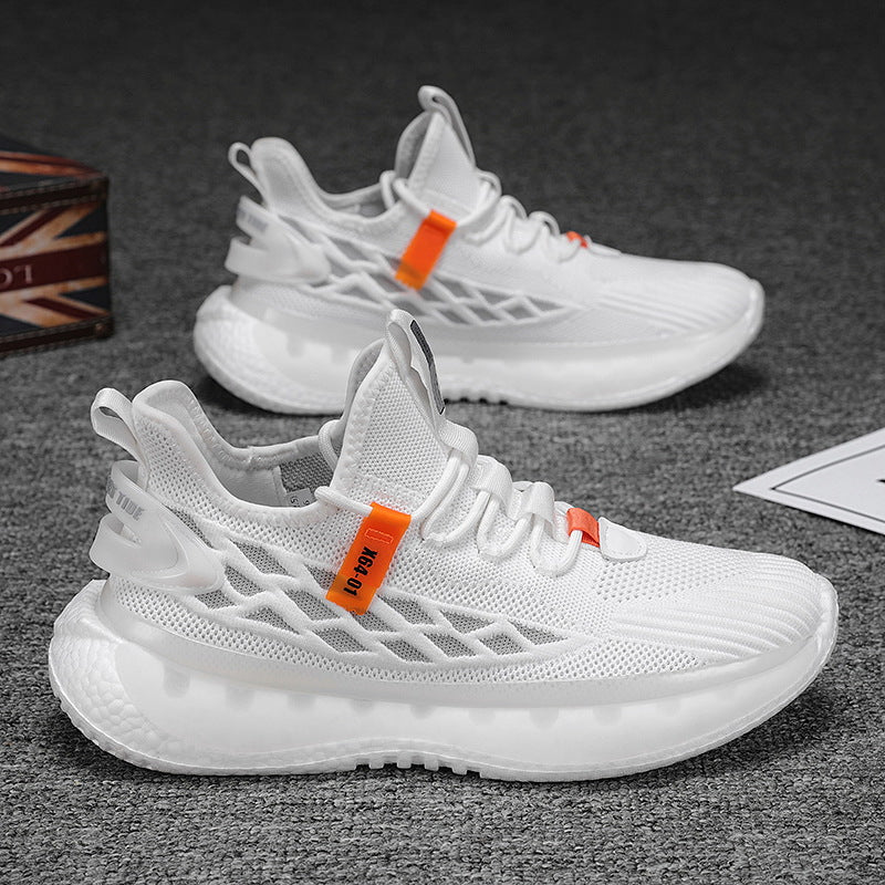 White sneakers with orange accents on a dark surface