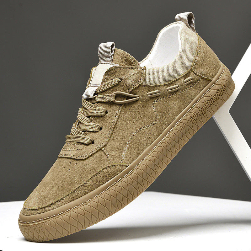 Beige sneaker on a white stand with a dark background