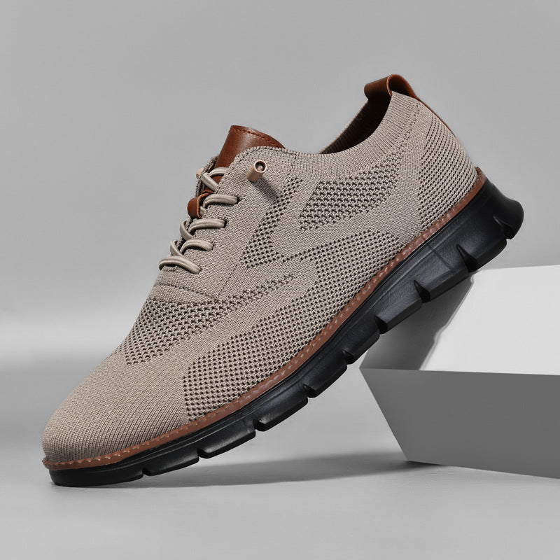 Beige sneaker with brown accents on a gray background