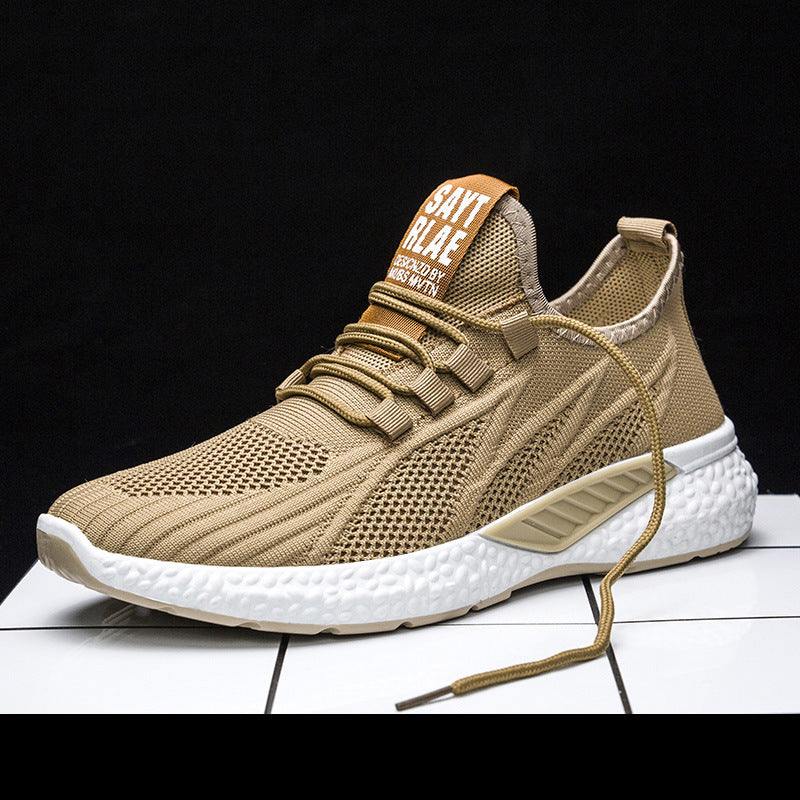 Beige sneaker with white sole on a black background