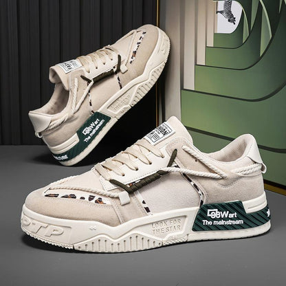 Beige sneakers with branding on a dark surface