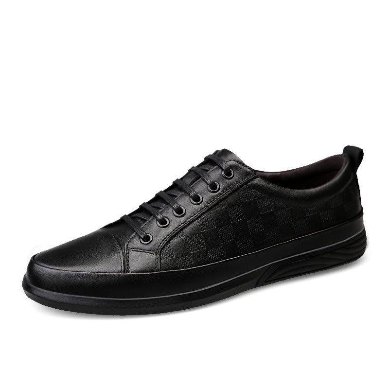 Black leather sneaker on a white background