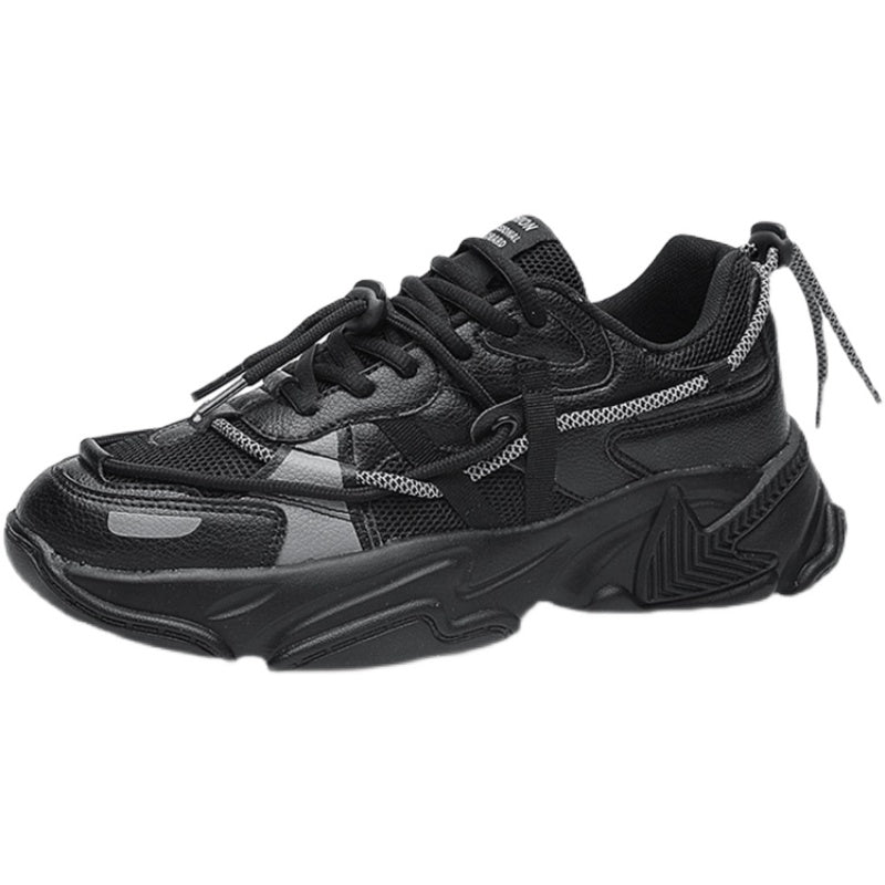 Black and gray athletic shoes on a white background