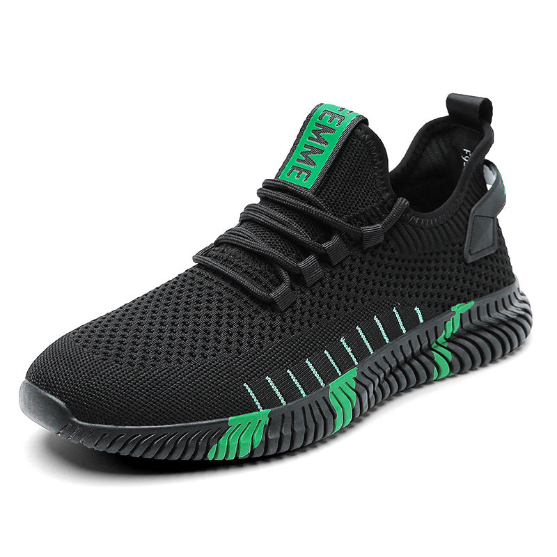 Black and green sneaker on a white background