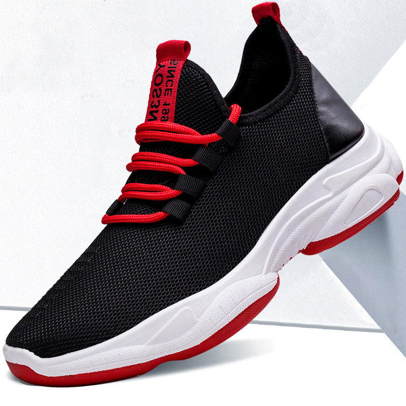 Black and red athletic shoes with white soles on a light gray background
