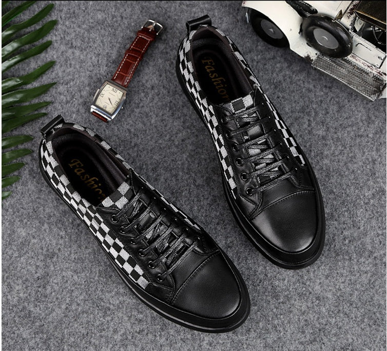Black checkered sneakers on a textured surface with a watch and vintage radio in the background.