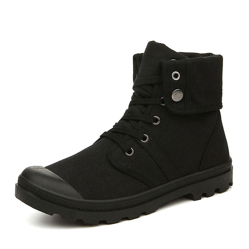 Black high-top sneaker with a white background