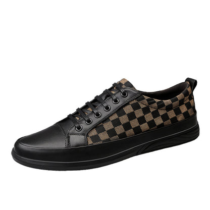 Black sneaker with checkered pattern on a white background