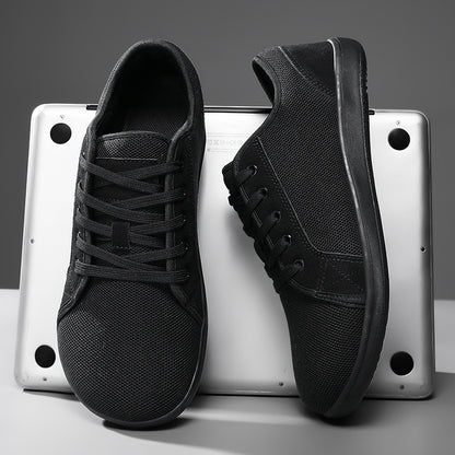 Black sneakers on a metallic surface with a gray background