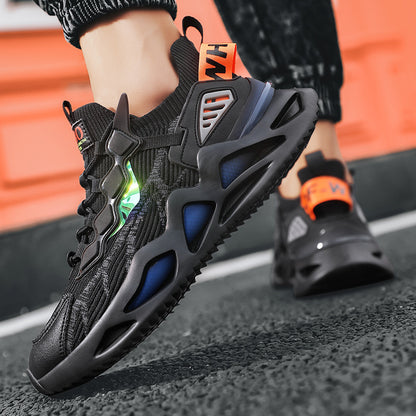 Black sneakers with blue accents on a track