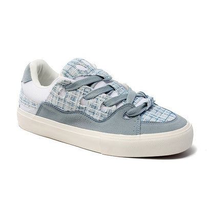 Blue and white checkered sneaker on a white background