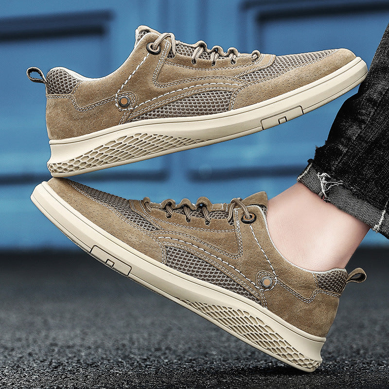 Brown sneakers worn by a person on a blue and black gradient background