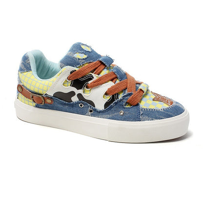 Children's sneaker with denim patchwork design on a white background