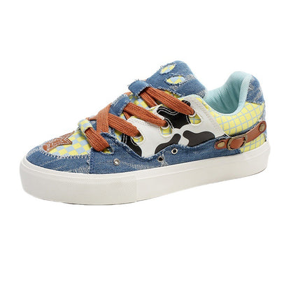Colorful children's sneaker with patchwork design on a white background
