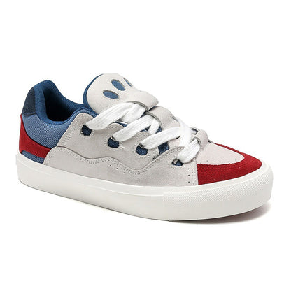 Multicolored sneaker with white laces on a white background