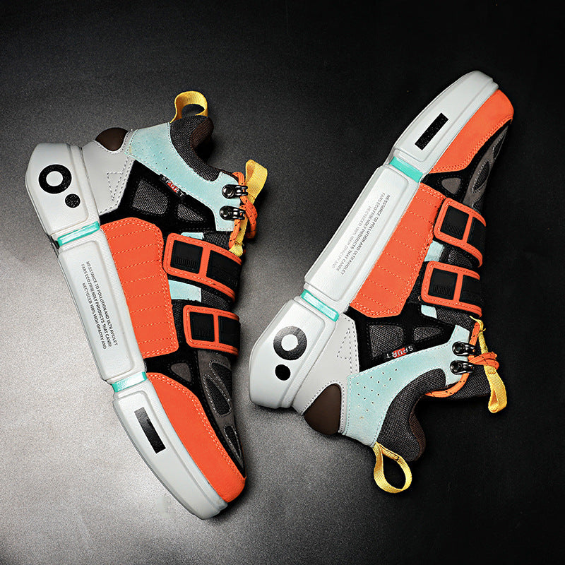 Pair of futuristic sneakers with orange and black design on a dark background