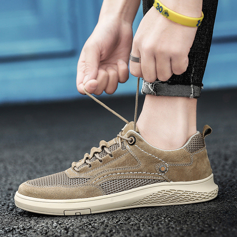 Person tying the laces of a brown sneaker on a blurred background