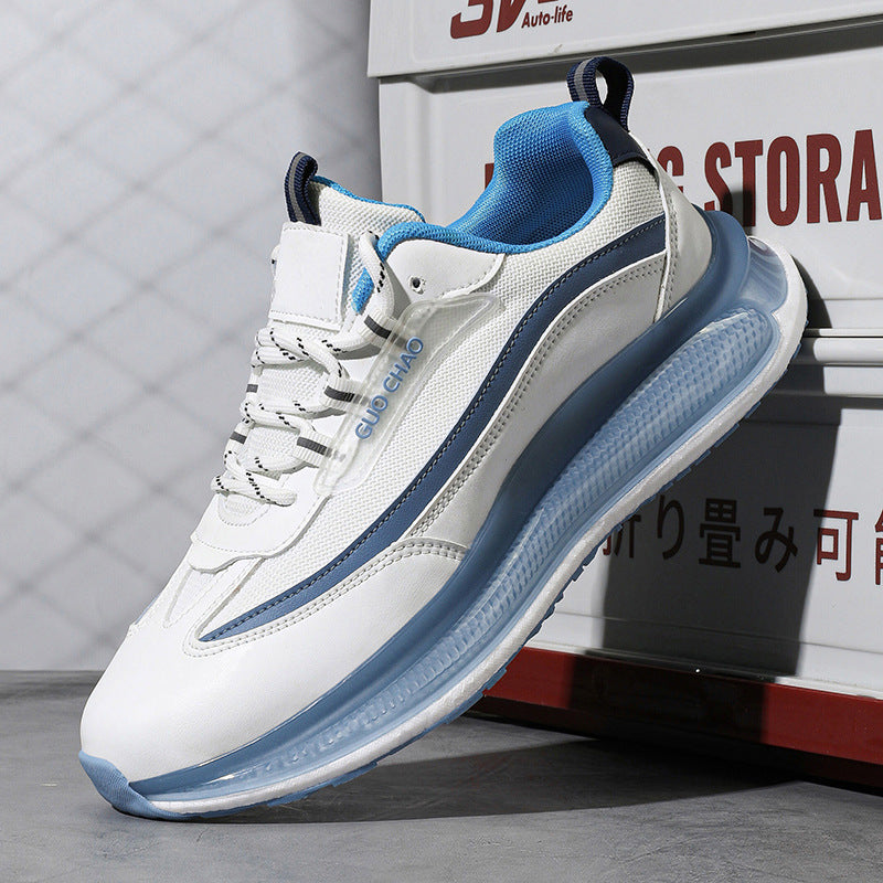 White and blue sneaker with visible branding on a gray background