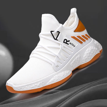 White and orange sneaker with brand logo on a dark background