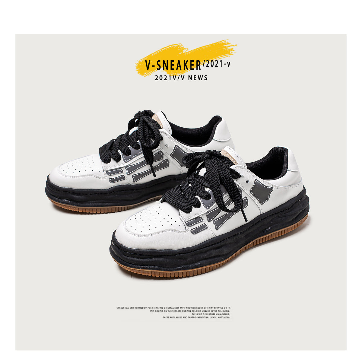 White sneakers with black accents on a light gray background, featuring 'V-SNEAKER/2021-V' text.