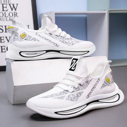 White sneakers with black and gray patterns on a gray surface