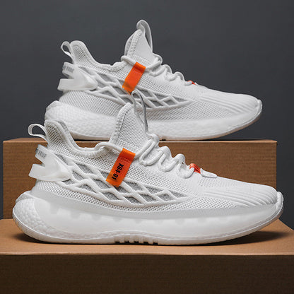 White sneakers with orange tags on a brown box against a dark background